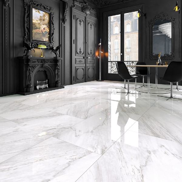 Siyah modern salonda uygulanan Bien Seramik Swan 60x120 parlak mermer görünümlü yer karosu.